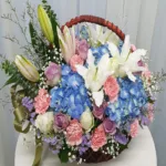 กระเช้าดอกไม้สีฟ้าชมพูโอรส