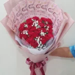 ช่อเรียงแบงค์ร้อยในช่อดอกไม้