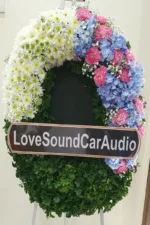 พวงหรีดดอกไม้สดสีชมพูฟ้า