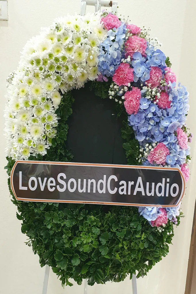 พวงหรีดดอกไม้สดสีชมพูฟ้า