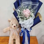 ช่อแบงค์พับกับตุ๊กตาเล็ก