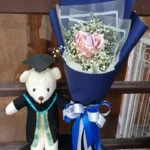 ช่อแบงค์พับกับตุ๊กตา