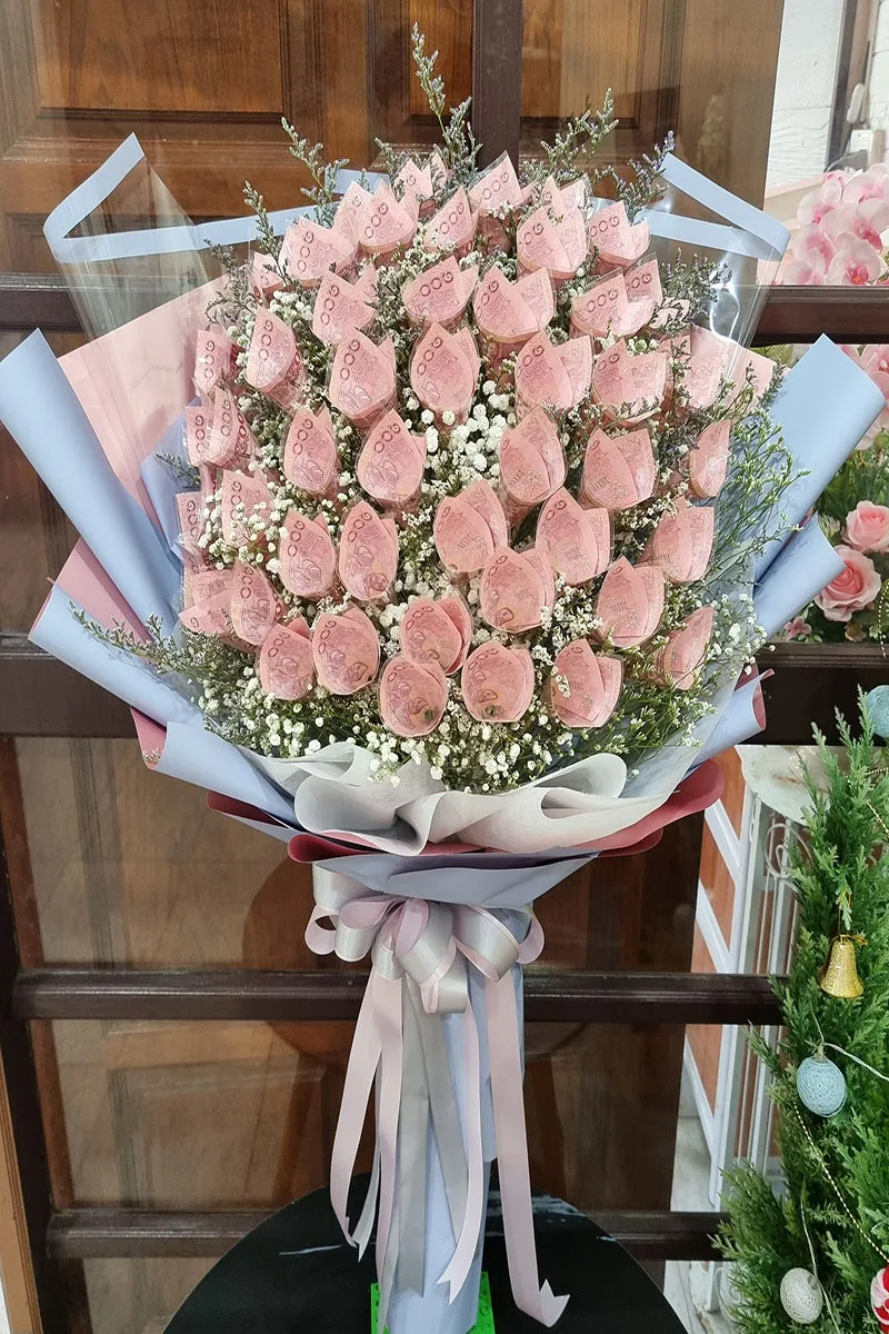 ช่อแบค์ร้อยม้วนทำดอก50ใบ ช่อแบงค์ม้วนทำดอก50ใบ