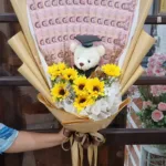 ช่อเรียงแบงค์ตุ๊กตาหมีรับปริญญา