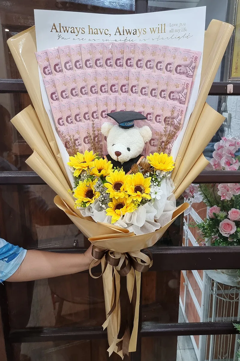 ช่อเรียงแบงค์ตุ๊กตาหมีรับปริญญา