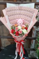 ช่อเรียงแบงค์กับตุ๊กตาหมี