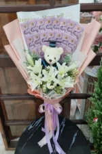 ช่อดอกลิลลี่ตุีกตาหมีรับปริญญา