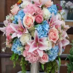 แจกันดอกไม้ประดิษฐ์สีชมพูฟ้า