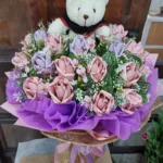 ช่อแบงค์พับกับตุ๊กตารับปริญญา