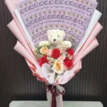 ช่อเรียงแบงค์500กับตุ๊กตา