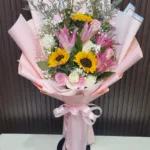 ช่อดอกทานตะวันลิลลี่ห่อสีชมพู