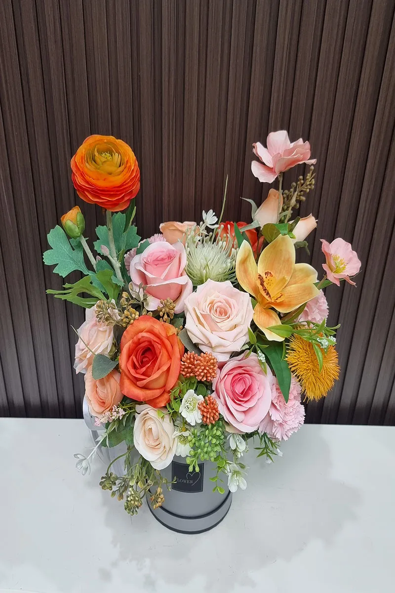 แจกันดอกไม้ประดิษฐ์สีส้ม แจกันดอกไม้ประดิษฐ์สีส้ม