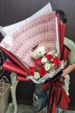 ช่อเรียงแบงค์ร้อยตุ๊กตารับปริญญา